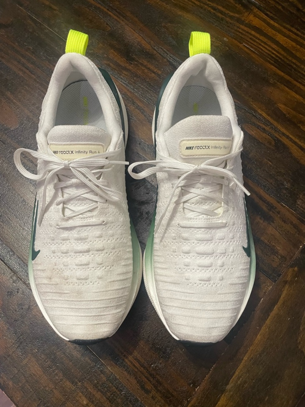Nike White Running Shoes with Neon Yellow Pull Tabs and Green Swoosh